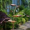 copper hosta water feature in a garden pond- by Gary Pickles of Metallic Garden
