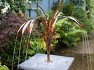 water reed copper water sculpture