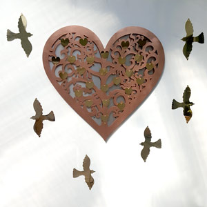 filigree heart with soaring bird plaques